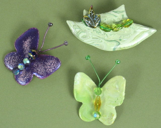 Green Hat and Butterfly Pins